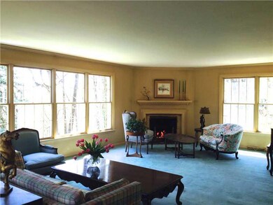Living Room. two window walls and corner fireplace