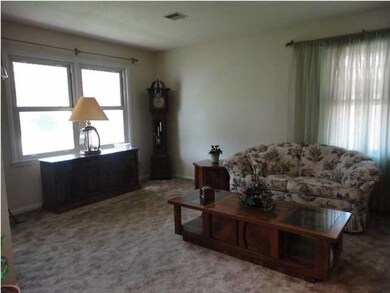 Bright Living Room ~ All New Windows throughout Ho