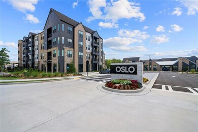View of property with uncovered parking