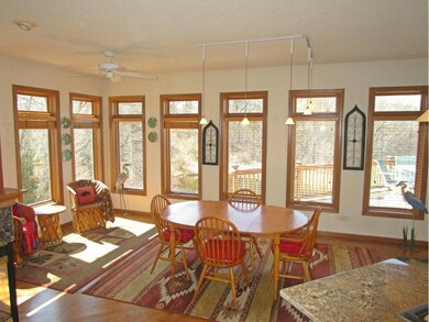 Enjoy this lovely open sunroom off the kitchen, wi