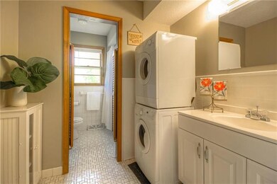 Enjoy 1st floor utilities in the hall bath & the s