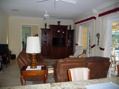 Living area, French doors to patio