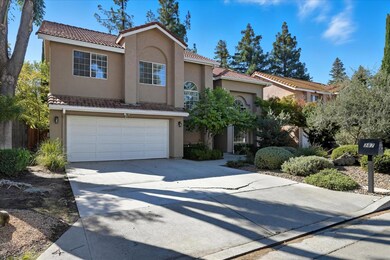 387 E Braddock Dr, Fresno, CA 93720 - photo 2