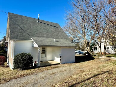 back of the house and driveway