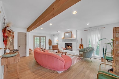 This incredible Family Room beckons the outside to come inside! Inviting Family Room with plenty of space!!