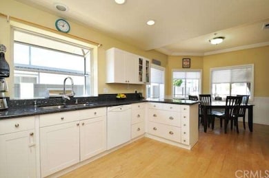 Garden window over the sink adds natural light.