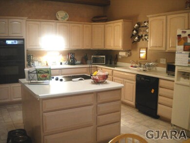 Huge kitchen with pantry and ample storage.