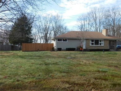 Set back from the street, with lots of frontage.