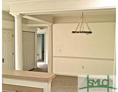 Dining Room. Dining room bordered with columns.