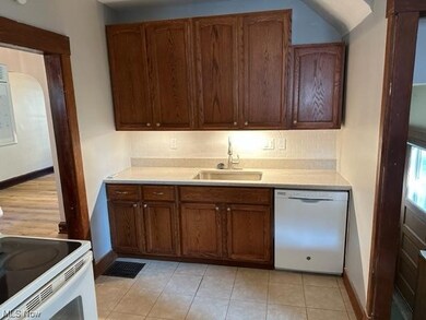 New backsplash, sink, countertop and new dishwasher
