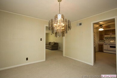 Dining room opens to living and kitchen