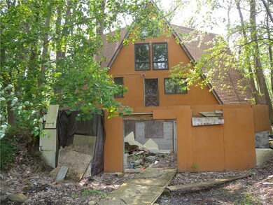 Back of house where attached garage was supposed t