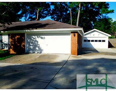 Exterior Front. 4 car garage