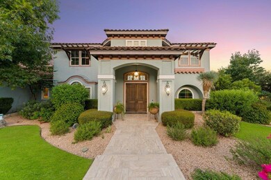 Mediterranean / spanish home featuring stucco siding and a tiled roof