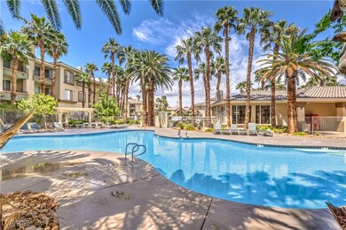Community pool with a patio area