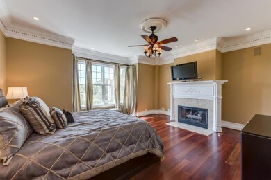 Master suite wing has fireplace and wetbar