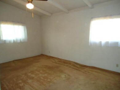 The master bedroom has lots of natural light.