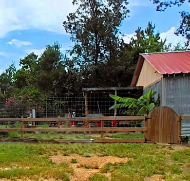 Gate entering the fenced section of the property l