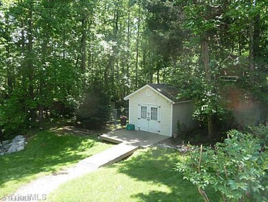 Yard/Garden. Storage building and tree house