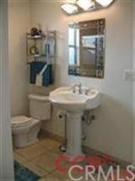 Master bath with tiled shower also serves as the d