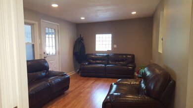Family room has bamboo wood floors