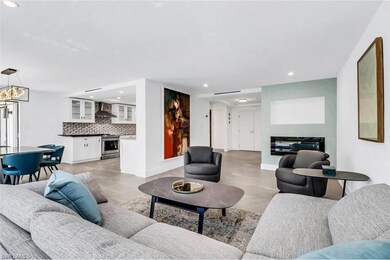 Living room with a notable chandelier
