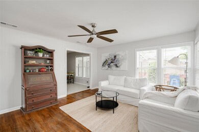 Living room featuring dark wood finished floors, 
