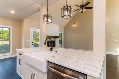 Example of the home being built on this lot