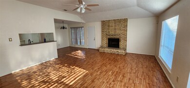 This spacious living area receives plenty of natur