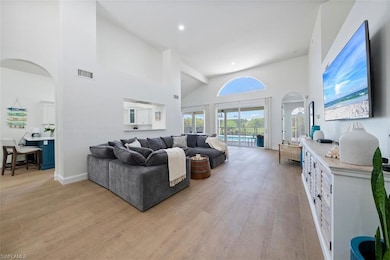 Volume ceilings throughout living area, kitchen opened into living room