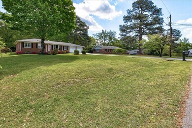 View of yard with an attached garage