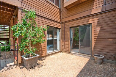 Private courtyard with 2 sliding glass windows.