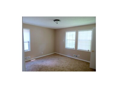 Master bedroom with 1/2 bath & new windows on sing