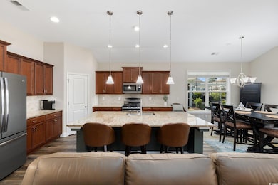Kitchen featuring stainless steel appliances, visi
