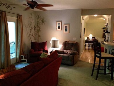 Living Room. Living room leads out to a covered ba