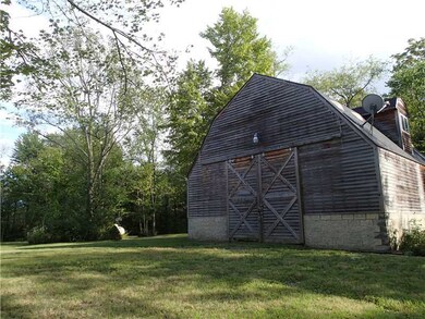 Storage. This barn structure has a half bath, an o