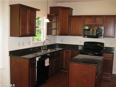 Exterior Front - Standard Cabinets.  Upgrades - gr