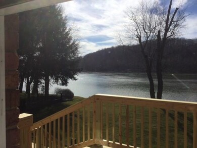 Early spring view across river from deck.
