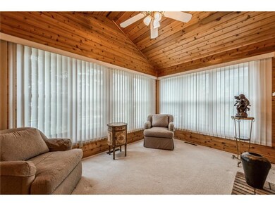 LIGHT AND BRIGHT NOTTY PINE SUN ROOM HAS A VAULTED