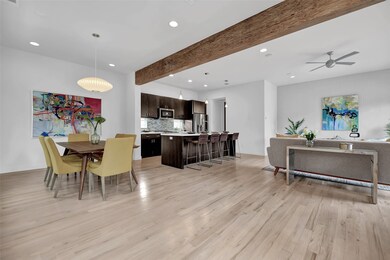 Second floor is an open floor plan with hardwood f