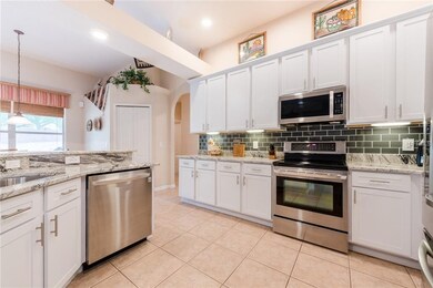 Spacious kitchen showcasing 42
