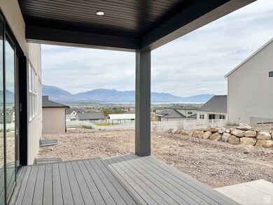 Wooden deck featuring a mountain view and a residential view