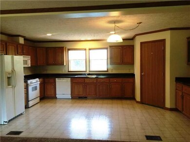 Kitchen. Open eat-in kitchen with lovely cabinetry