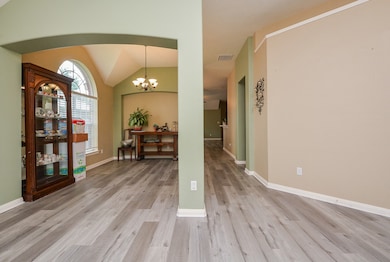 View of dining room from flex living area.