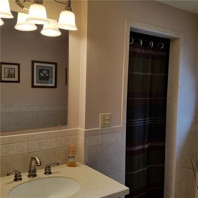 BEAUTIFUL TILE WORK ON THE FLOOR AND WALLS.