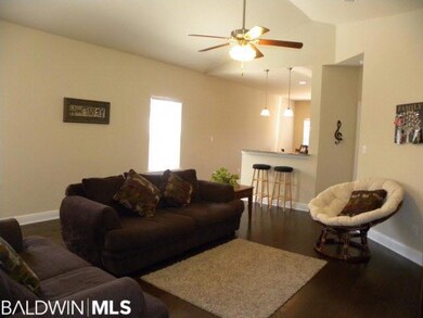 Living Room features hardwood floors, vaulted ceil