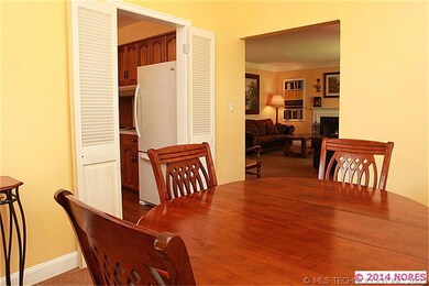 The kitchen is convenient to the dining room.