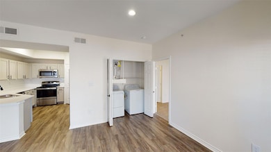 Kitchen featuring stainless steel appliances, wash