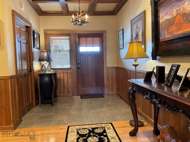 View of Front entry foyer featuring tile floor, cu