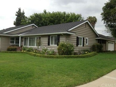 Large corner lot with manicured landscaping